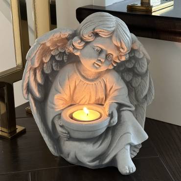 An angel with a place for a candle